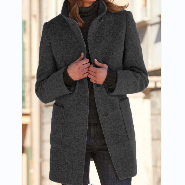 Vintora™ - Dames Retro-Geïnspireerde Lange Windjack met Knoopsluiting en Opstaande Kraag