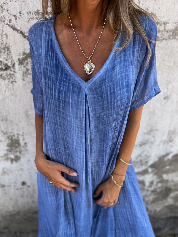 NOVERA | KLEID MIT V-AUSSCHNITT